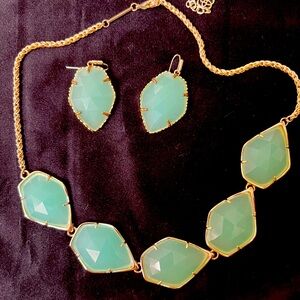 Kendra Scott necklace and earrings.